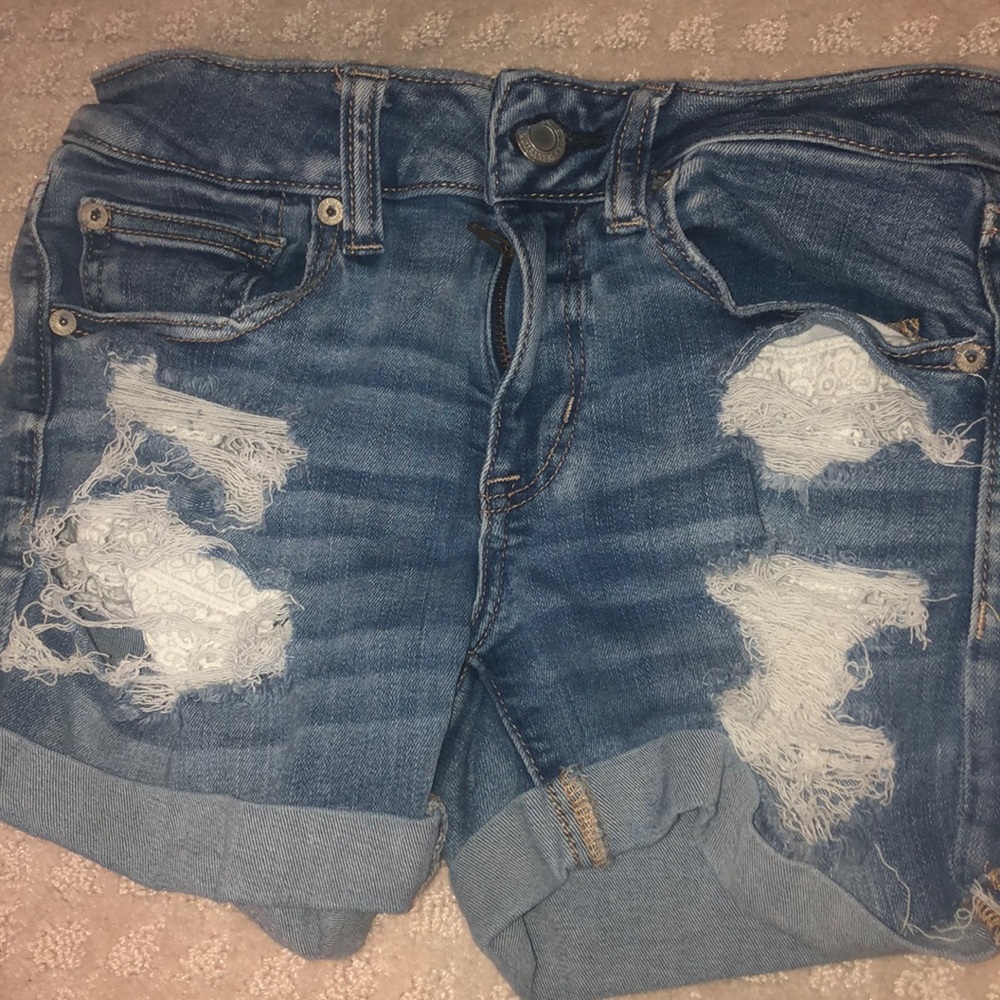 American Eagle ripped blue light jeans